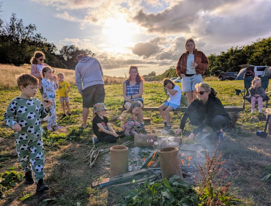 Fire pit tending at the WCG July 2025 - resized Wishing Tree at Green Heart Space